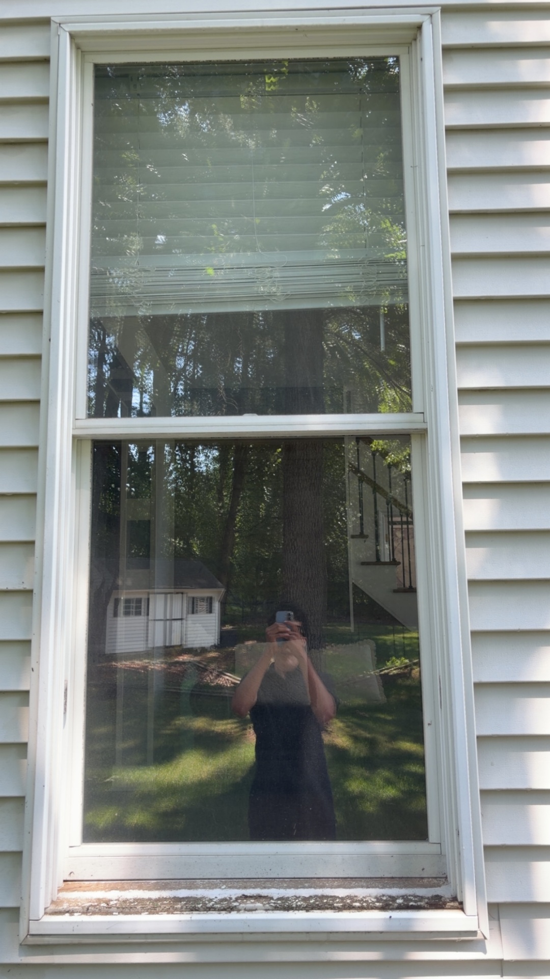 Before window cleaning — dirty sills, grimy frames, and dull, hazy glass on a residential window in Saratoga County NY
